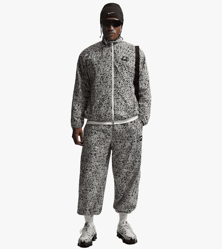 m nk air wvn aop pant tl